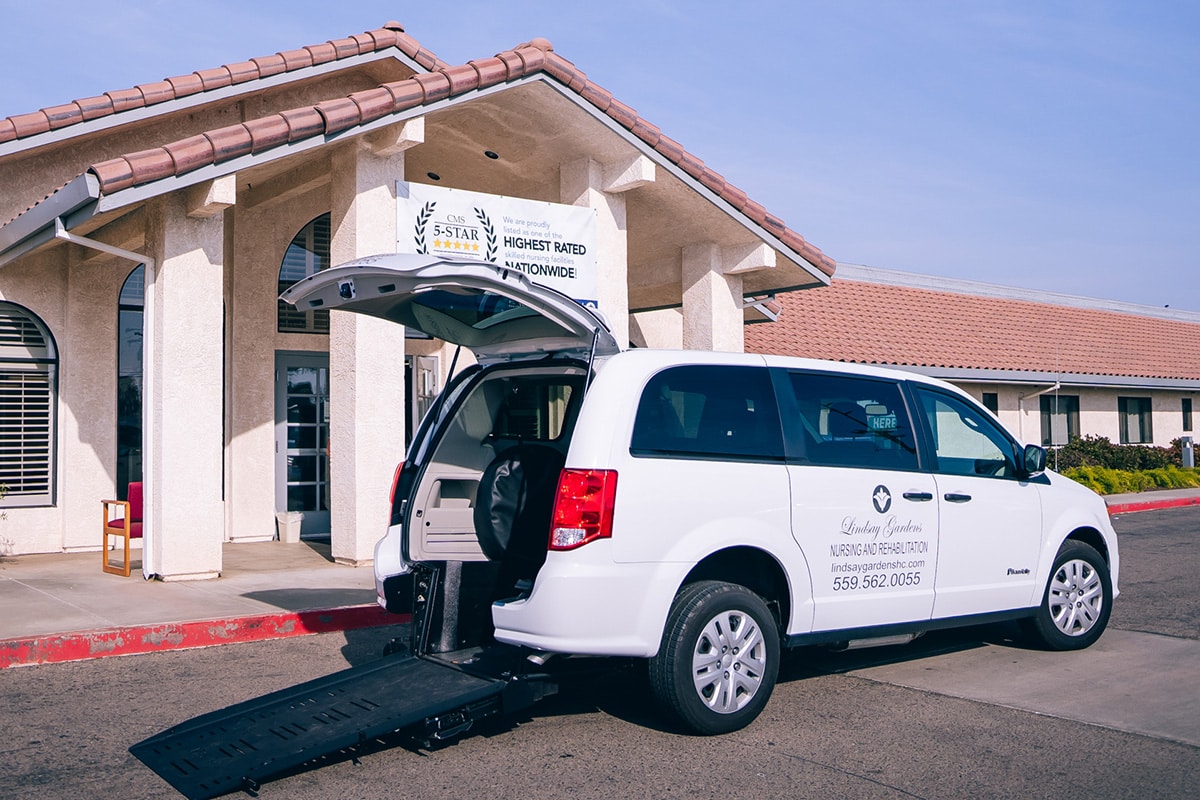 View of front entrance with Lindsay Garden's transportation van